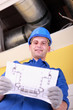 Photo: Engineer with a heating plan Engineer with a heating plan