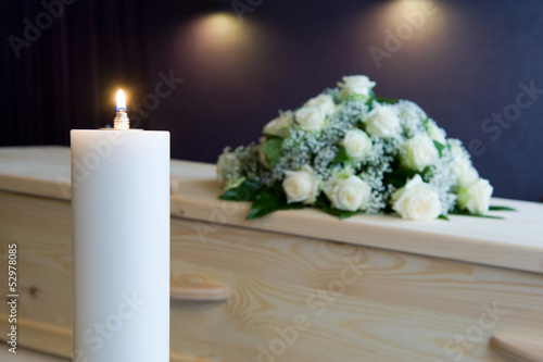 Photo: Burning candle in mortuary Burning candle in mortuary