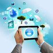 Close-up of hands holding tablet pc