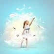 Photo: Little girl playing with paper airplane Little girl playing with paper airplane