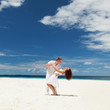 Happy couple on the beach