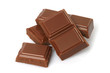 Broken milk chocolate bar isolated on white background .