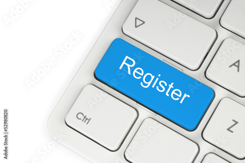 Illustration: Blue register button on keyboard close-up. Blue register button on keyboard close-up.