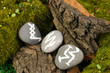 Fortune telling  with symbols on stone close up