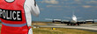 Police at airport, plane.