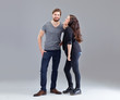 Photo: Young couple on grey background II Young couple on grey background II