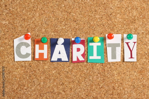 Photo: The word Charity on a Cork Notice Board The word Charity on a Cork Notice Board