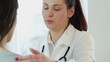 Young sad female doctor comfort patient