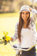 cheerful young woman in a bicycle outdoor