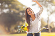 young woman having fun riding a bike