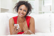 African American Girl Listening to MP3 Player Headphones