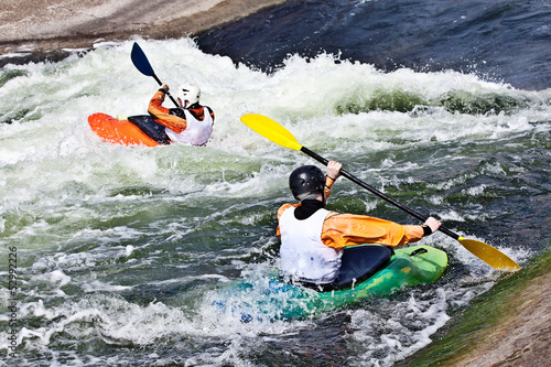 Photo: two active kayakers two active kayakers