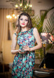 Photo: Seductive brunette woman in luxury manor, vintage style Seductive brunette woman in luxury manor, vintage style