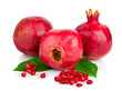 Ripe pomegranates with leaves isolated