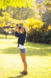 female photographer taking pictures outdoors