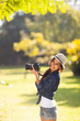 young photography student take photos outdoors