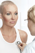 Foto: Portrait of young nice woman on medical examination Portrait of young nice woman on medical examination
