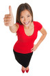 Photo: Happy woman giving a thumbs up gesture Happy woman giving a thumbs up gesture