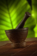 Close up view of  brown mortar inside on green back