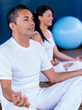 Couple practicing yoga