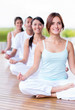 Calm people doing yoga