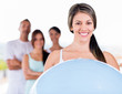 Foto: Woman with a Pilates ball Woman with a Pilates ball