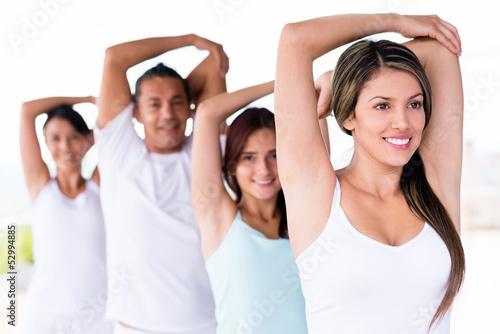 Photo: Yoga people stretching Yoga people stretching