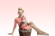 Photo: woman with creative look and cupcake woman with creative look and cupcake