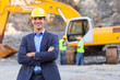 mine manager with arms crossed