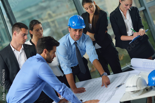 Photo: business people and engineers on meeting business people and engineers on meeting