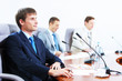 Photo: Three businesspeople at meeting Three businesspeople at meeting