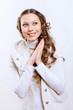 Photo: Young woman wearing warm sweater Young woman wearing warm sweater