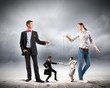 Businesspeople with marionettes