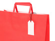 Red paper shopping bag with label