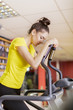 Pretty young woman in the gym
