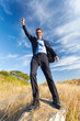young businessman enjoying freedom