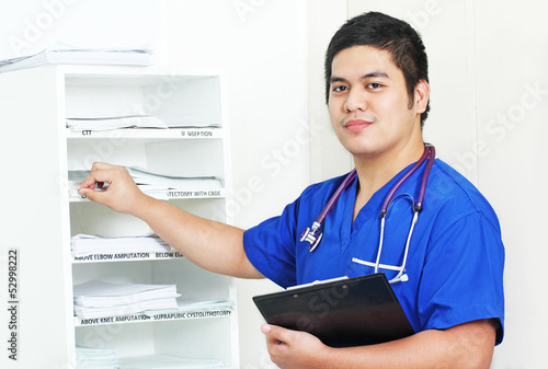 Photo: Nurse And The Medical Records Nurse And The Medical Records