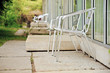 Alumina folding chairs on garden patios