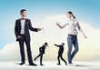 Businesspeople with marionettes