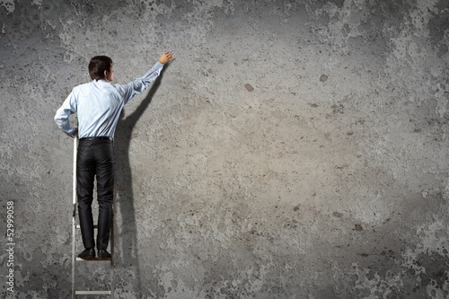 Photo: businessman drawing diagram businessman drawing diagram
