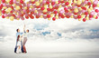 Photo: Family holding colorful balloons Family holding colorful balloons