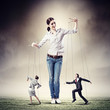 Businesswoman puppeteer