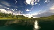 Time lapse clouds in mountain lake
