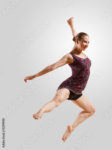 Photo: Girl in color dress dancing Girl in color dress dancing