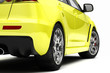 Illustration: Rear of a yellow car (focused) Rear of a yellow car (focused)