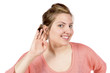 Listening woman with hand at ear