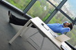 happy young business man at office