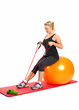 Frau mit Theraband