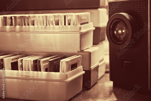 Photo: Slide projector and slides in a box Slide projector and slides in a box