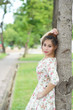 Photo: Young Asian woman outdoor portrait Young Asian woman outdoor portrait